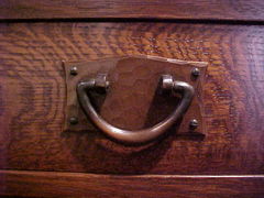 Close-up of hand-hammered copper hardware.